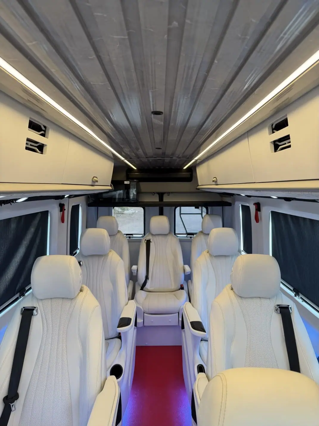3-Point Seatbelts & Aircraft-Style Cabin Lockers
